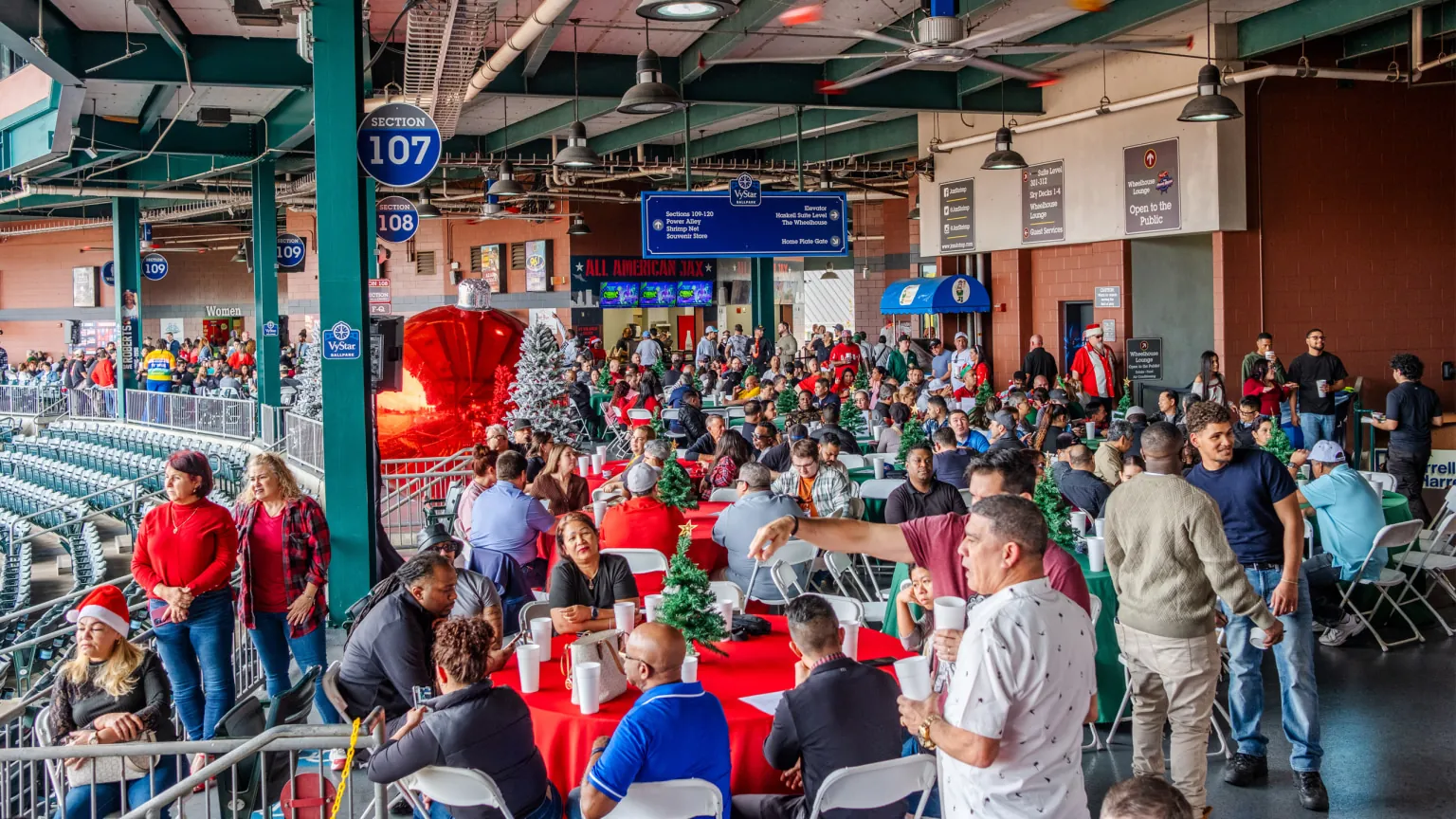 A large social event filling the ballpark concourse